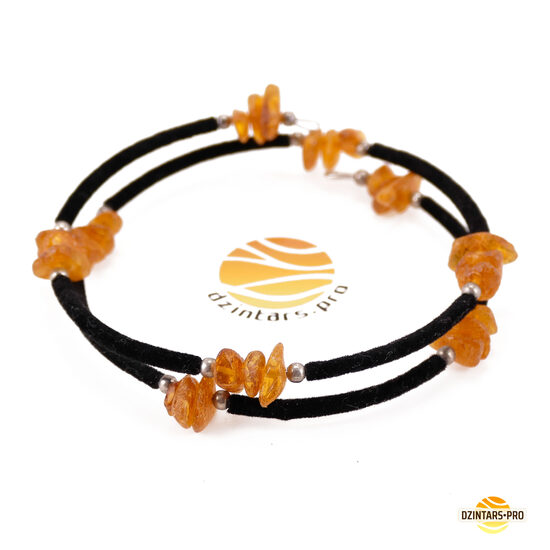 Butter-colored 2-3 turns of amber bracelet on a metal string